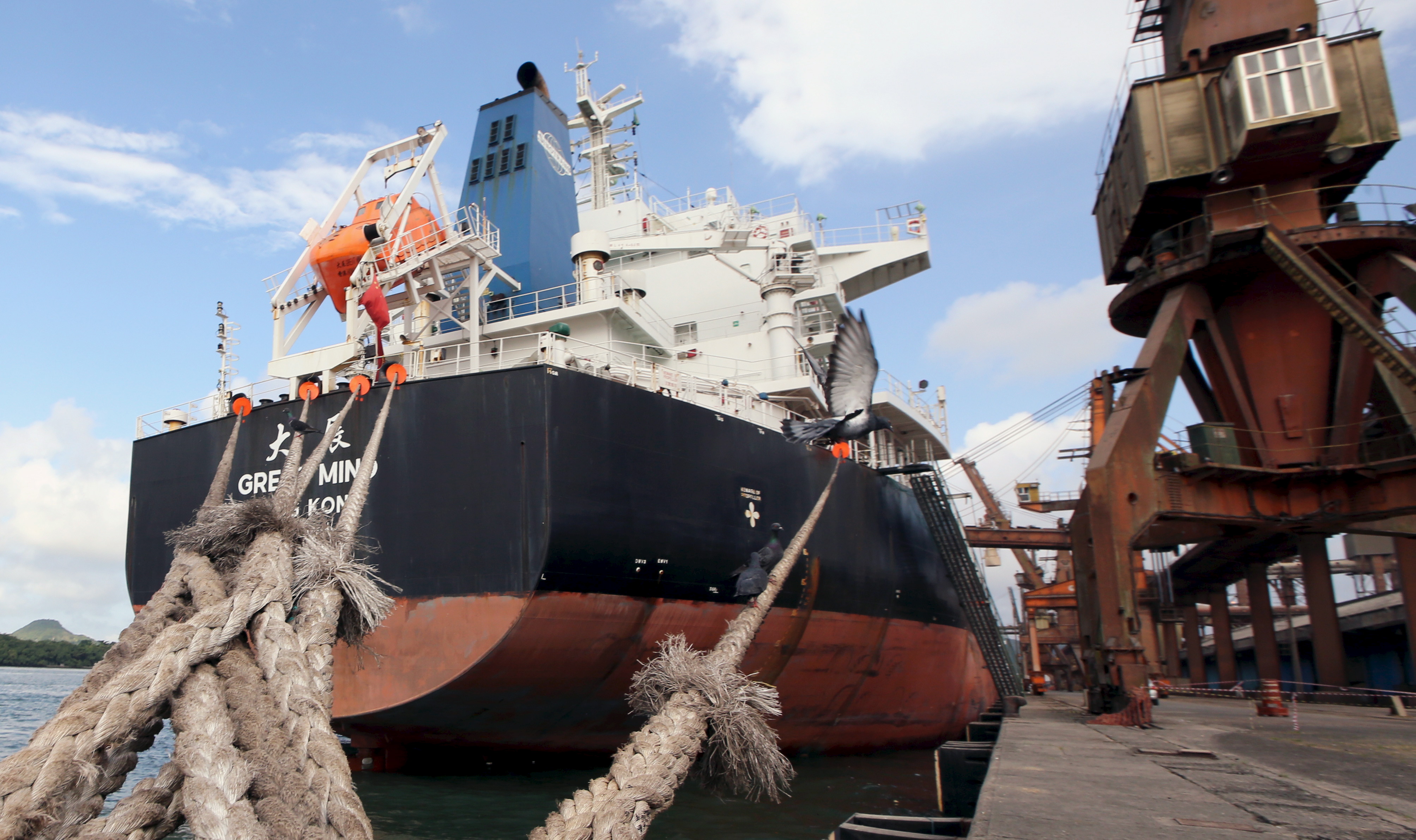 A Chinese ship is anchored at Port of Santos in Brazil while being loaded with soybeans. May 19, 2015. A Chinese ship is anchored at Port of Santos in Brazil while being loaded with soybeans. May 19, 2015.